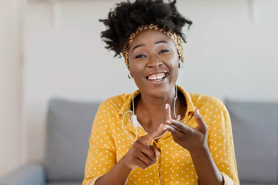 A woman explaining something to the camera